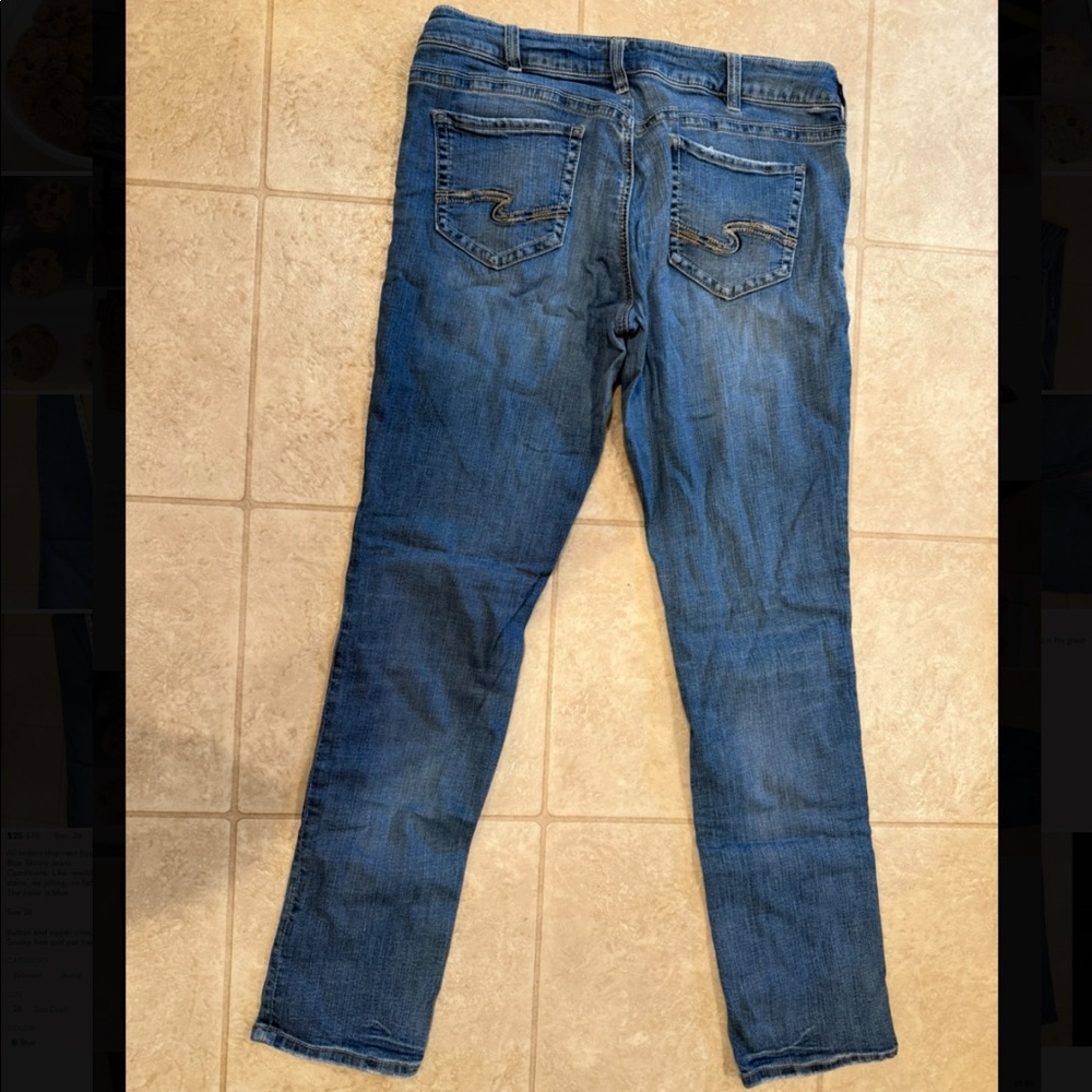 Silvers, medium wash, straight leg jeans.
